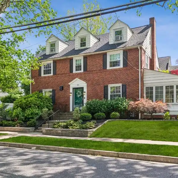 CLASSIC BRICK COLONIAL WITH CHEF’S DREAM KITCHEN