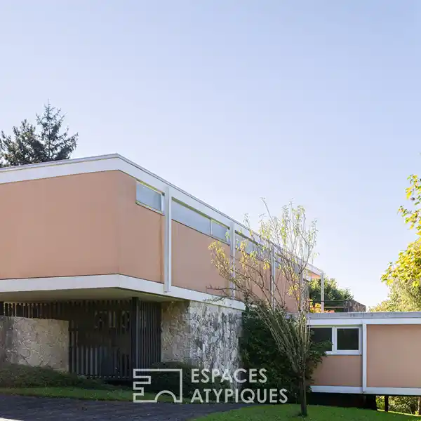 ARCHITECTURAL MASTERPIECE SURROUNDED BY WOODED GROUNDS