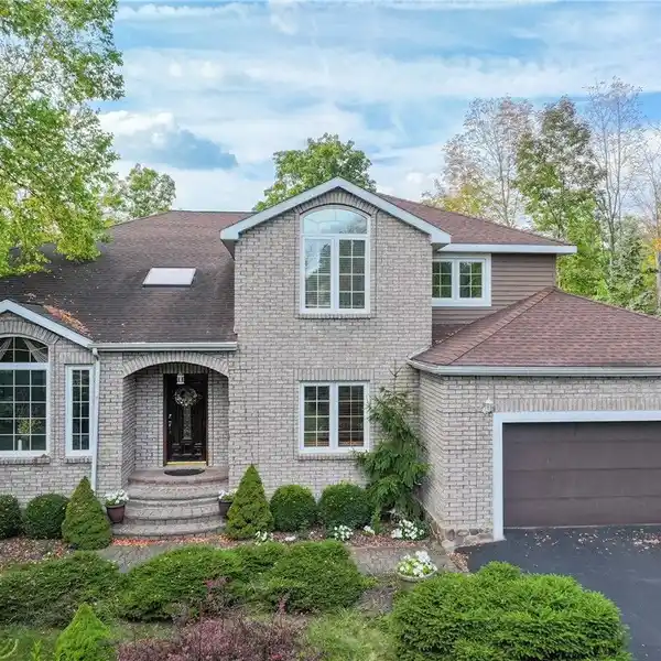 COVETED HOME IN THE SOUGHT-AFTER OLDE TOWN VILLAGE SUBDIVISION