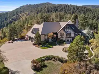 Fully Renovated Tudor Estate Atop 40 Acres