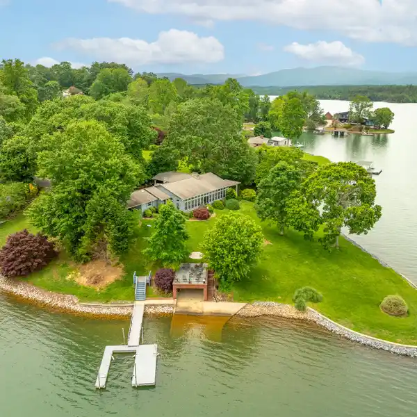 EXPANSIVE LAKEFRONT PROPERTY WITH BOAT HOUSE