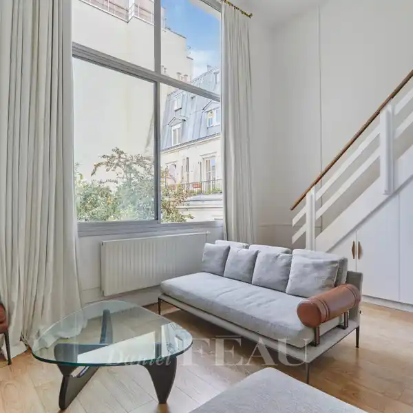 ARTISTIC DUPLEX WITH DRAMATIC LOFT-STYLE AMBIANCE