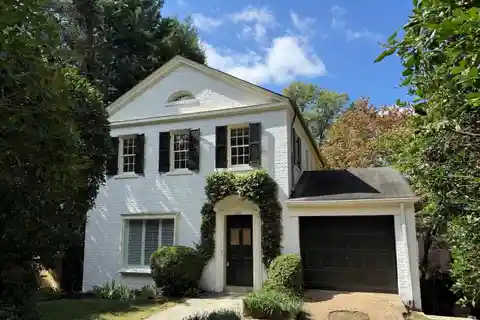 Storybook Federal with Sunlit Entertaining Spaces