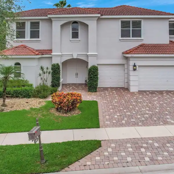 ONE-OF-A-KIND HOME ON AN OVERSIZED LAKEFRONT LOT