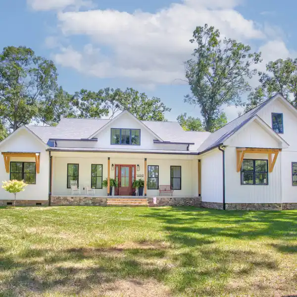 MODERN DESIGN AND RUSTIC CHARM OVER 11 ACRES OF LUSH LANDSCAPE
