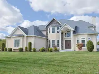 Elegant Colonial Featuring Smart Home and Finished Basement