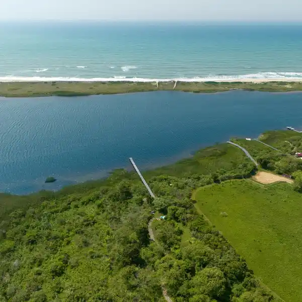 WATERFRONT RETREAT WITH PANORAMIC VIEWS AND PRIVATE BEACH