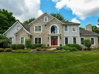 Stately Colonial in a Wooded Setting