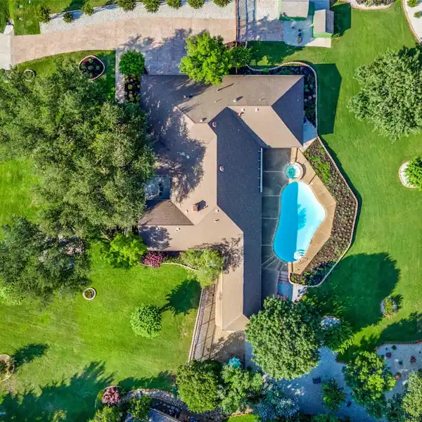 ONE-OF-A-KIND SINGLE-STORY RETREAT ON A LUSH ACRE
