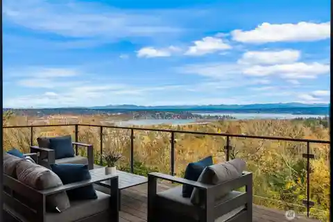 Expansive Picture Windows Framing Stunning Lake and Mountain Views