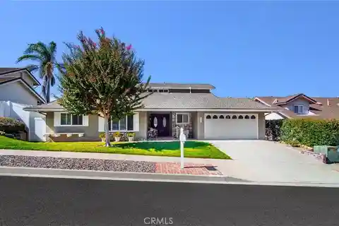 Relaxing Backyard Retreat with Patio and Fountain