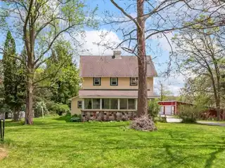 Charming Acreage with Barn and Art Studio