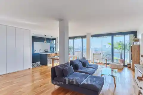 Sunlit 14th Floor Apartment with Seine Views