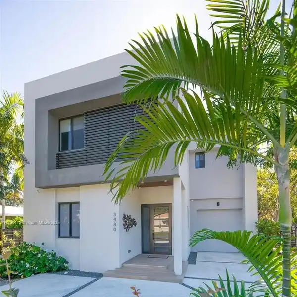 MODERN HOME ON A PRIME CORNER LOT
