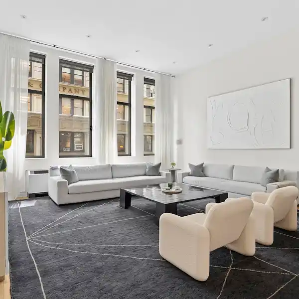 LOFT LIVING REDEFINED WITH DRAMATIC ELEGANCE