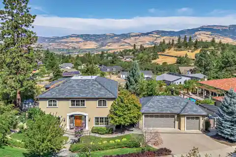 French Provincial-Inspired Custom Home with Two Lots