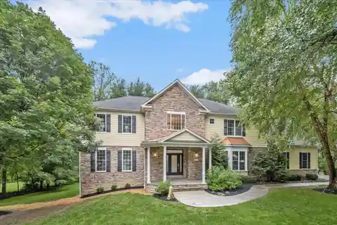 Custom Masterpiece Surrounded by Mature Trees