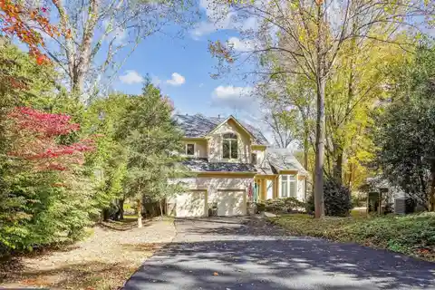 Sunlit Retreat Overlooking Butler Pond