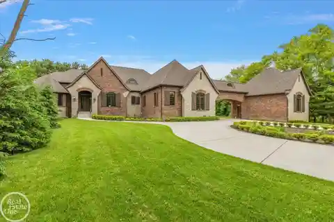 Stunning Custom Ranch with Six-Car Garage