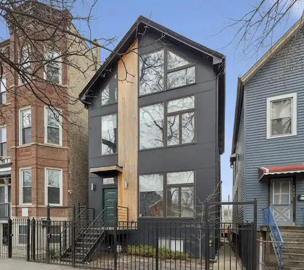 ONE-OF-A-KIND SINGLE-FAMILY HOME ON AN OVERSIZED LOGAN SQUARE LOT