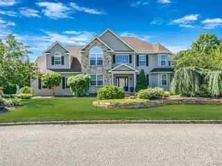 Updated Post-Modern Colonial in Country Manor Estates