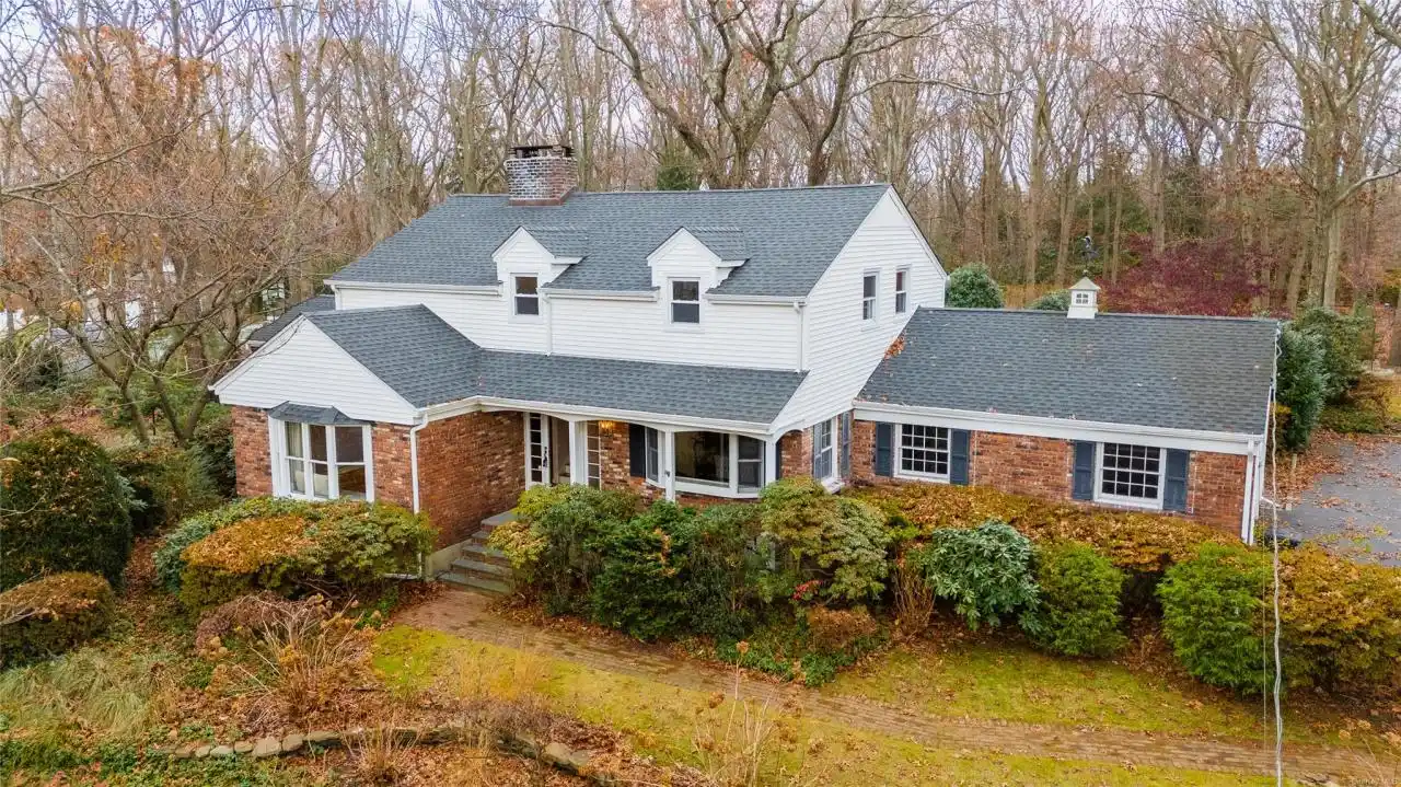 Meticulously Maintained Retreat on Two Wooded Acres