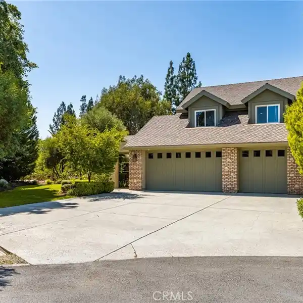 COMPLETELY REMODELED ESTATE ON A PEACEFUL CUL-DE-SAC