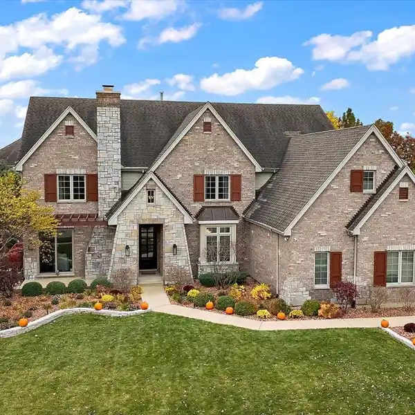 IMPRESSIVE BRICK HOME WITH LUXE INDOOR-OUTDOOR LIVING