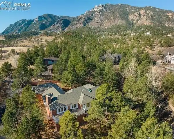 BEAUTIFULLY TREED PROPERTY BY THE BROADMOOR SOUTH GOLF CLUB