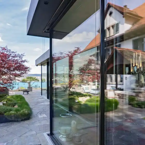 HISTORIC ELEGANCE MEETS MODERN DESIGN ABOVE LAKE ZURICH