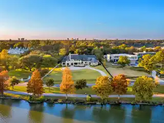 Exceptionally Designed French Transitional Home on an Unparalleled Gated Lot