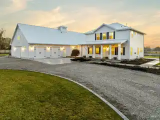 Custom Modern Farmhouse Set on Expansive Acreage