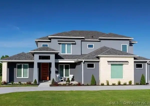 CONTEMPORARY ELEGANCE ON PEACEFUL CORNER LOT