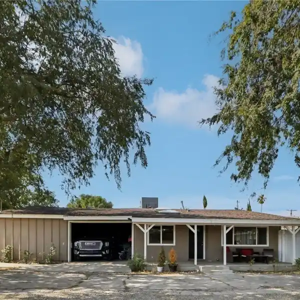 TWO HOMES WITH ENDLESS POTENTIAL ON LARGE LOT