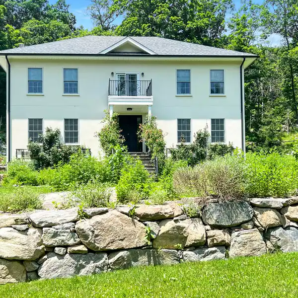 MODERN FARMHOUSE ON OVER NINE ACRES