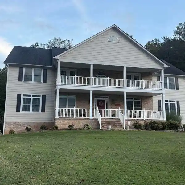 TWO BEAUTIFUL HOMES ON EXPANSIVE PROPERTY