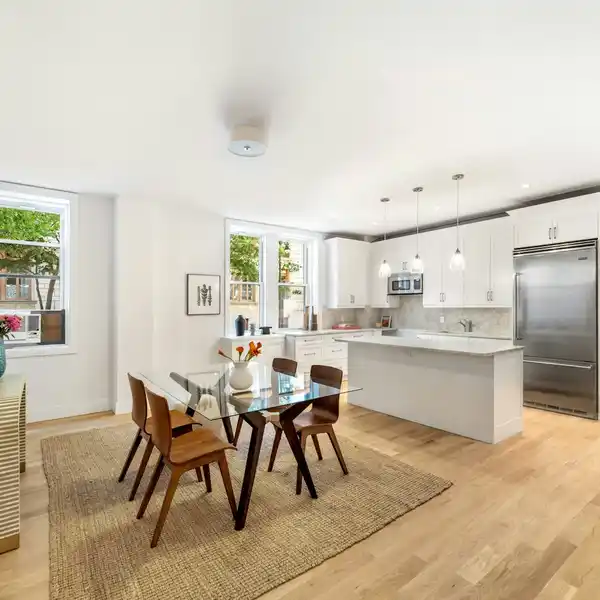 SUN-FILLED GUT RENOVATED HOME IN A DISTINGUISHED CONDOMINIUM