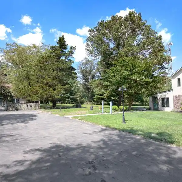HOUSE PLUS A RENOVATED COTTAGE ON NEARLY FOUR ACRES