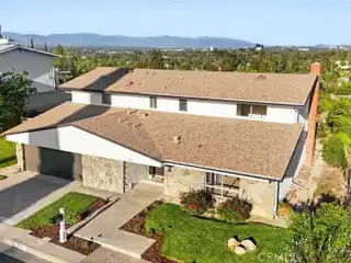 Storybook Retreat with City-light Vistas