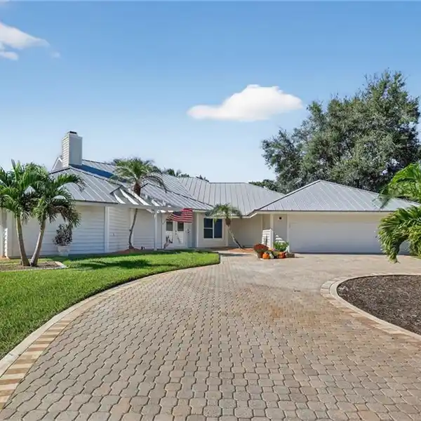 STUNNING GOLF COURSE HOME WITH WATER VIEW