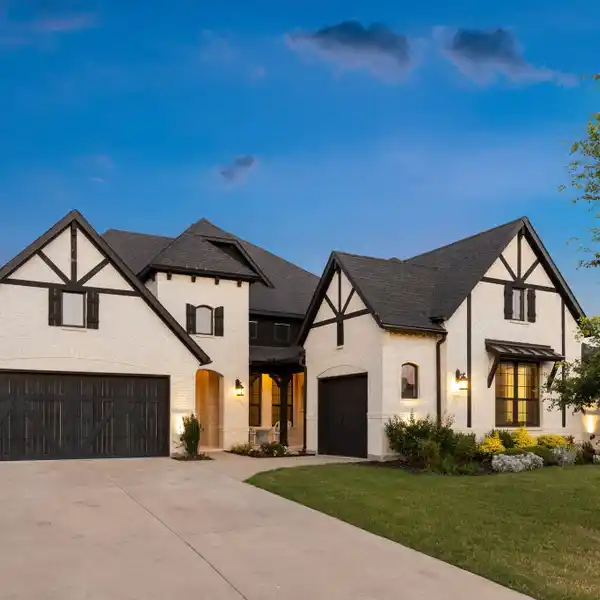 MODERN TUDOR CHARM IN THE HEART OF THE  MUSTANG LAKES