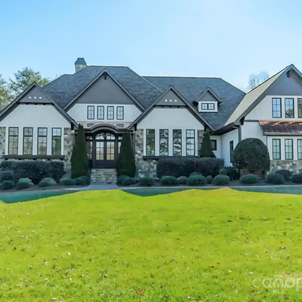 EXTRAORDINARY FIVE-ACRE WOODED ESTATE