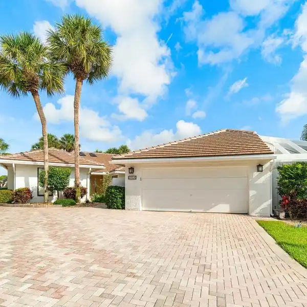 BEAUTIFULLY REMODELED AND EXPANDED HOME IN AN EXCLUSIVE COMMUNITY