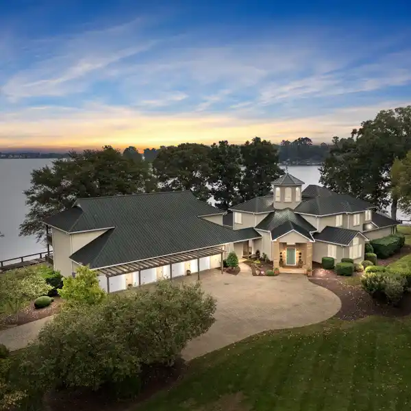 RESORT-STYLE LIVING ON AN EXPANSIVE POINT LOT