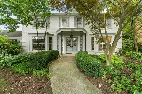 Classic Bloomfield Village Brick Colonial with Endless Potential