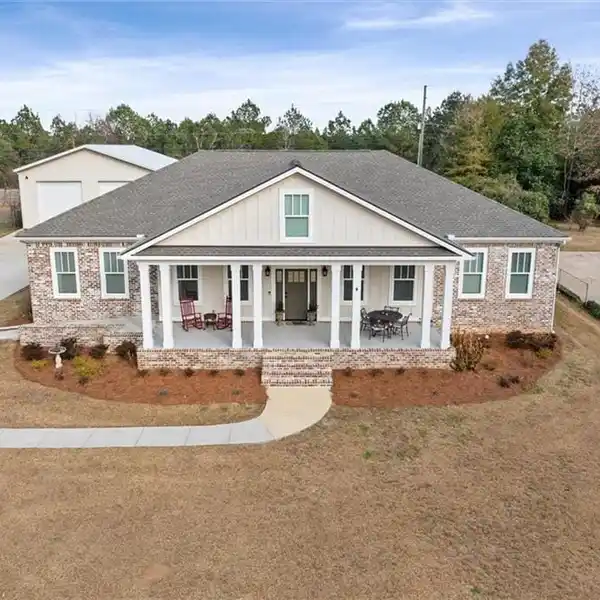 BRICK HOME IN SPANISH FORT ESTATES WITH EXPANSIVE GARAGE/WORKSHOP
