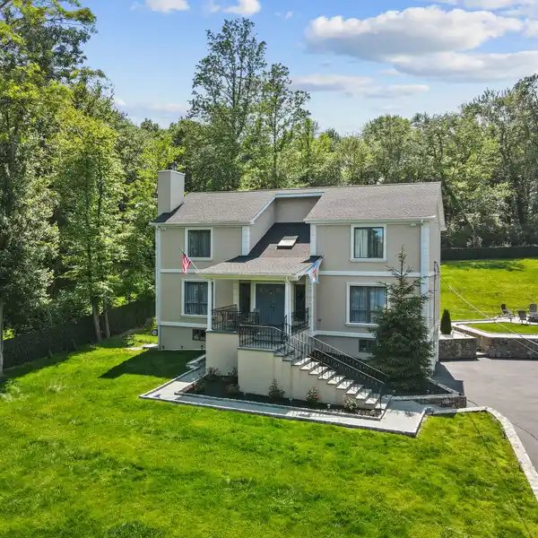 LIGHT-FILLED HOME WITH HIGH-QUALITY UPDATES