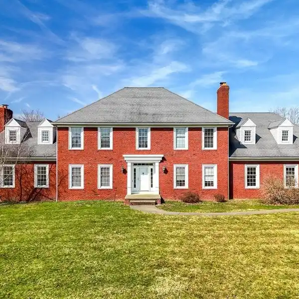 ALL-BRICK COLONIAL IN A SOUGHT-AFTER DEVELOPMENT