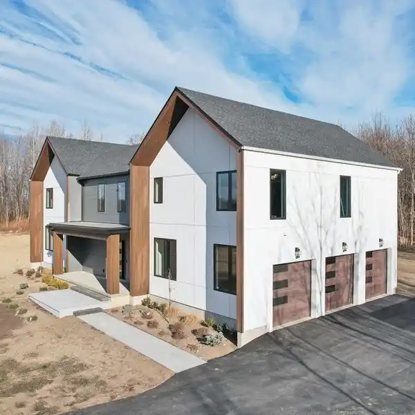 UNIQUE NEW CONSTRUCTION ON OVER FIVE ACRES