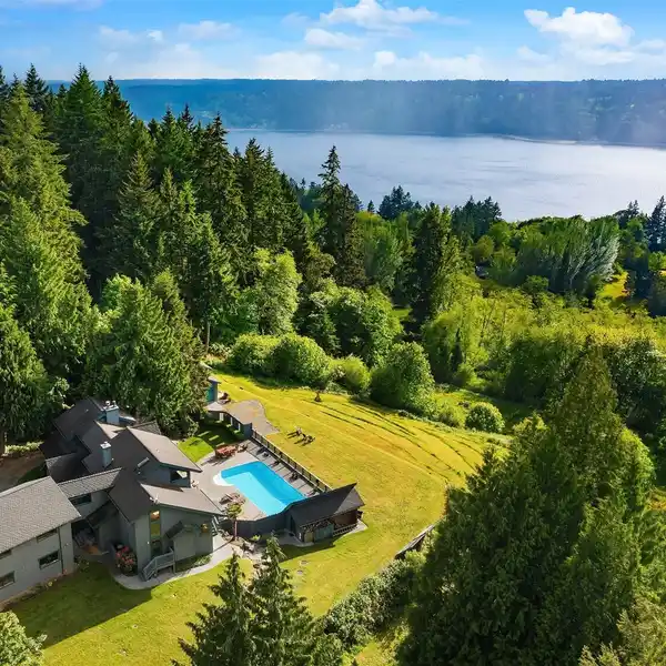 STUNNING MOUNTAIN VIEWS ON NEARLY FIVE PRIVATE ACRES